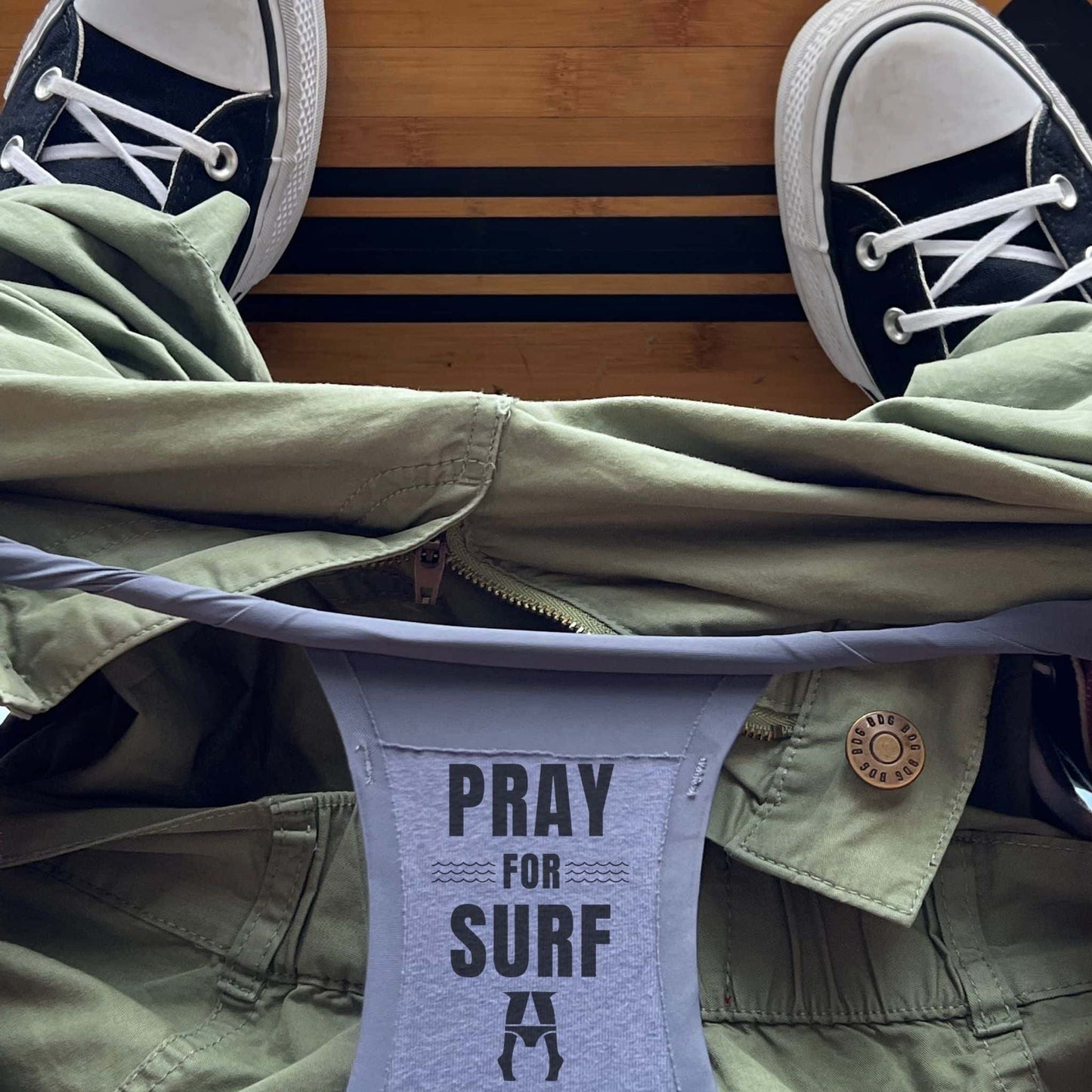 Person wearing sneakers and pray for surf daily briefs super comfy underwear.