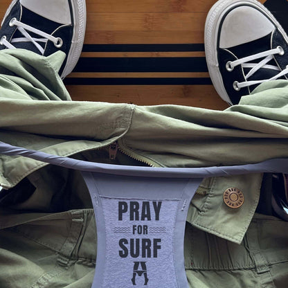 Person wearing sneakers and pray for surf daily briefs super comfy underwear.