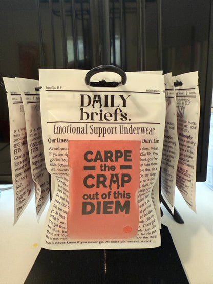 point of sale display for Daily Briefs Carpe diem underwear in newspaper packaging