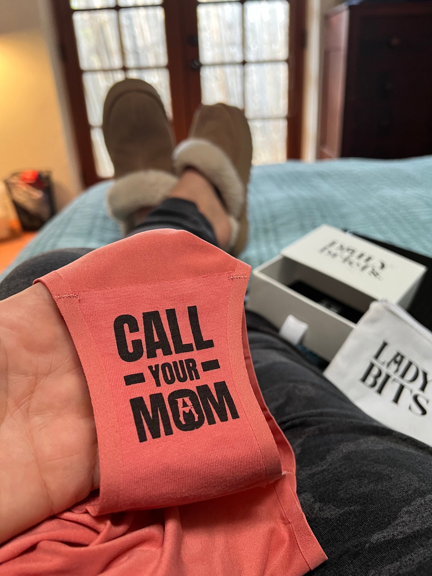 women with Call Your Mom underwear and daily briefs gift box with free gift lady bits purse. a box 
